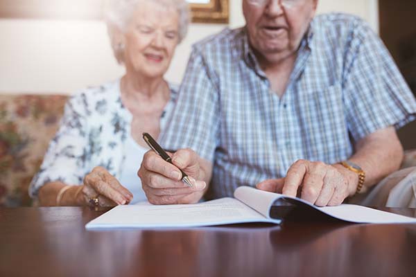 A picture of two elderly couples preparing their will in Southampton, New York